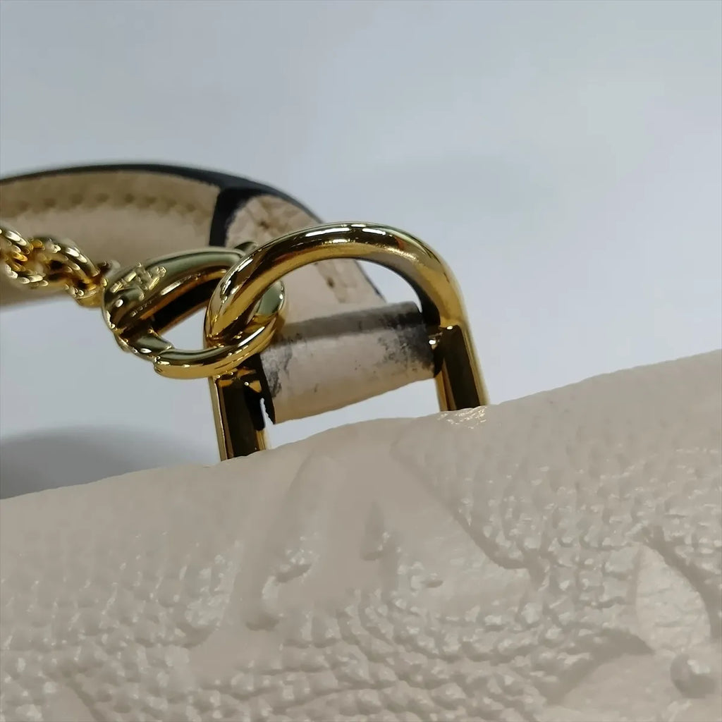 Louis Vuitton Empreinte Nano Madeleine Beige