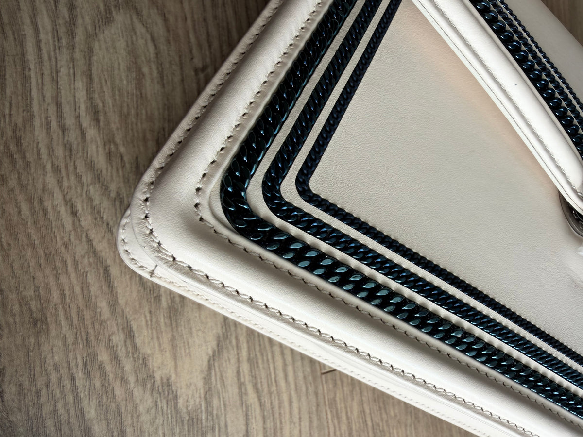 Bvlgari White With Blue Chain Around Serpenti