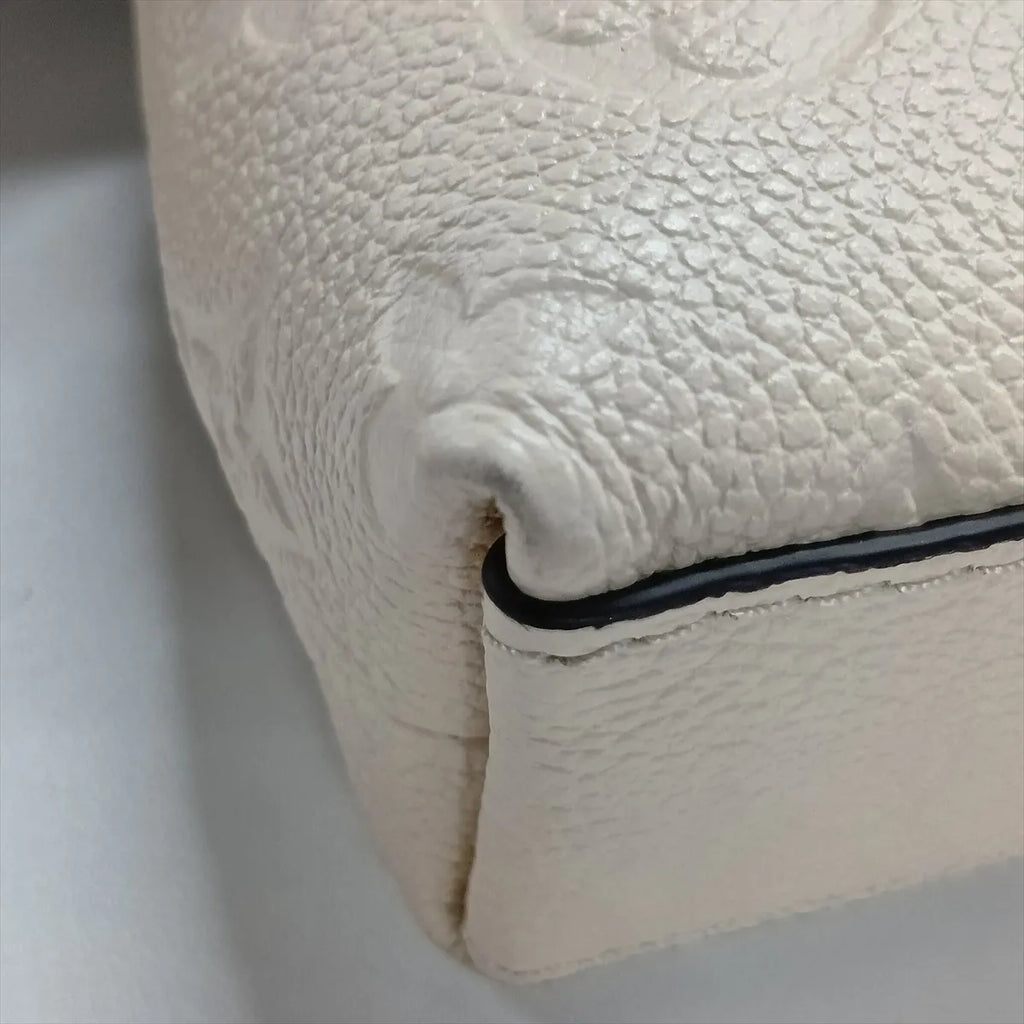 Louis Vuitton Empreinte Nano Madeleine Beige