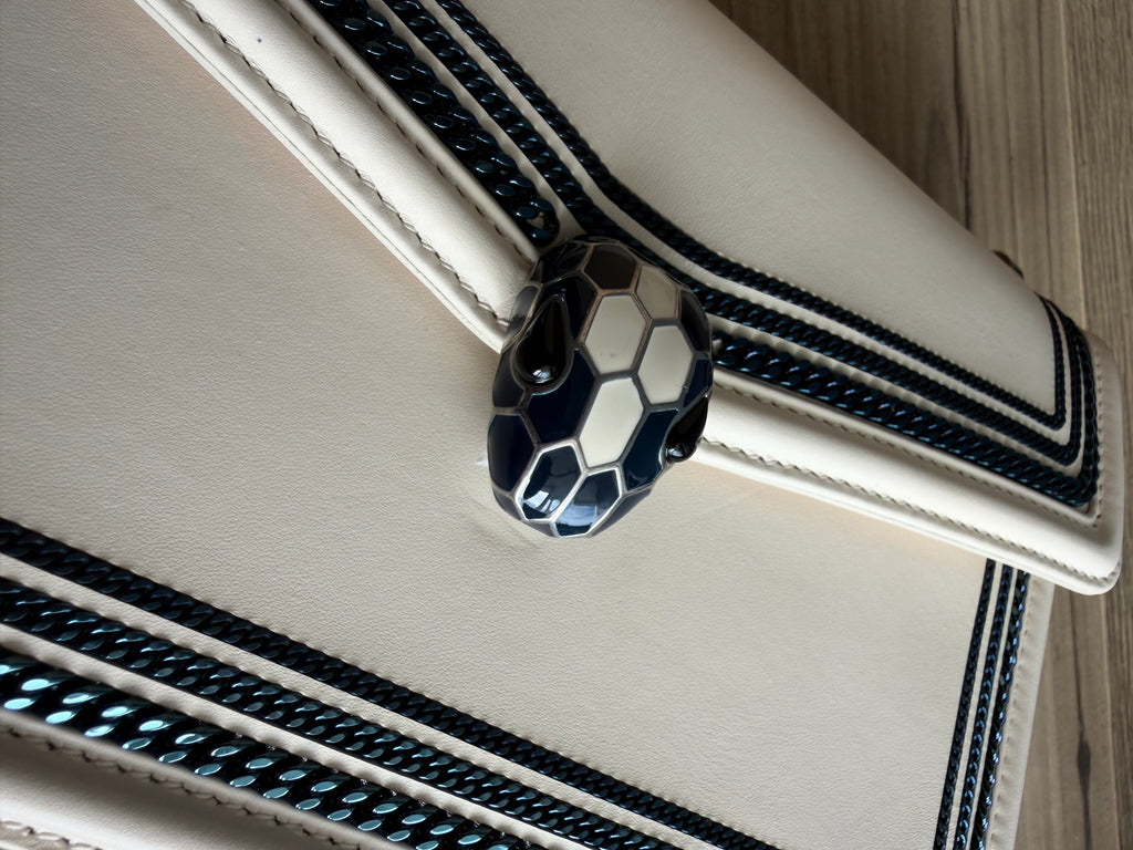Bvlgari White With Blue Chain Around Serpenti